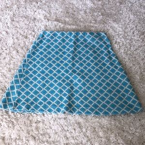 Blue and white patterned skirt.